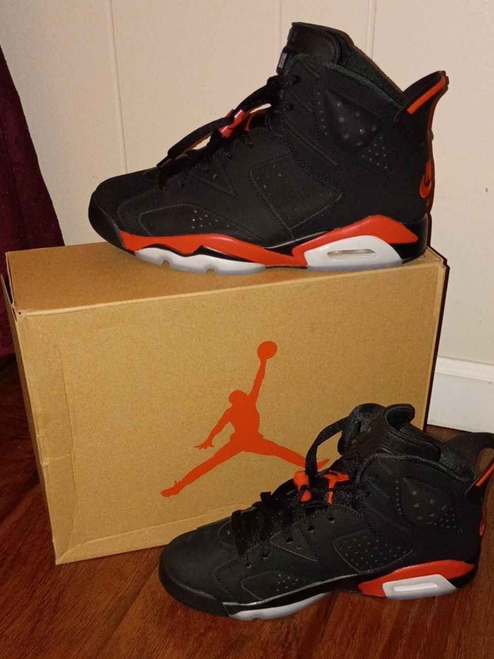 Jordan Women Men Unisex Black and Orange High-Top Sneakers